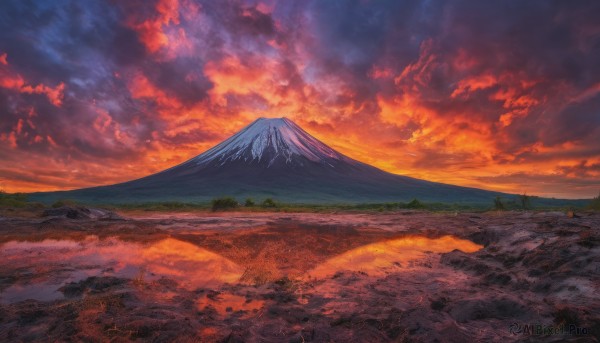 A landscape amidst a vivid sunset outdoors