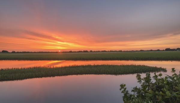 A landscape framed by the beauty of a calm sunset outdoors