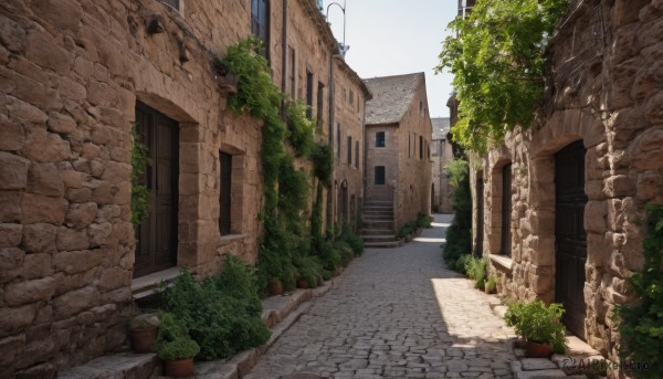 outdoors,sky,day,tree,no humans,window,plant,building,scenery,stairs,door,potted plant,road,bush,wall,house,brick wall,street,flower pot,alley,blue sky,shadow,grass,path,arch,pavement