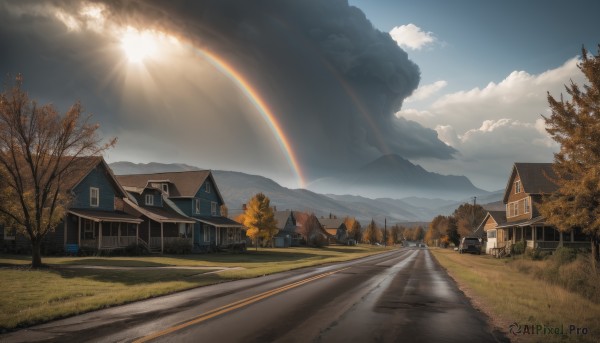 outdoors,sky,day,cloud,tree,blue sky,no humans,window,sunlight,cloudy sky,grass,building,nature,scenery,mountain,sun,road,house,rainbow,street,fence,landscape