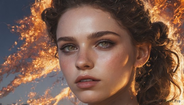 A female amidst a calm fiery cloud