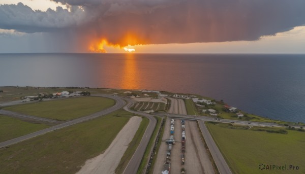 outdoors,sky,day,cloud,water,no humans,ocean,cloudy sky,grass,fire,ground vehicle,building,scenery,sunset,mountain,horizon,road,bridge,river,landscape,hill,railroad tracks,tree,sunlight,nature,motor vehicle,smoke,city,field,street