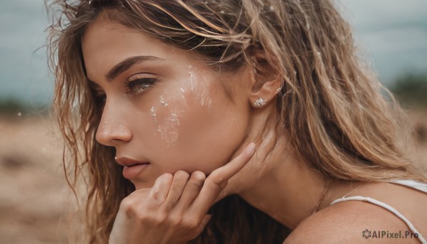 1girl,solo,long hair,looking at viewer,blonde hair,brown hair,brown eyes,jewelry,earrings,outdoors,day,hand up,mole,blurry,from side,lips,wet,grey eyes,eyelashes,depth of field,blurry background,portrait,close-up,freckles,realistic,nose,bare shoulders,necklace,profile,wavy hair,looking away,messy hair,hand on own chin