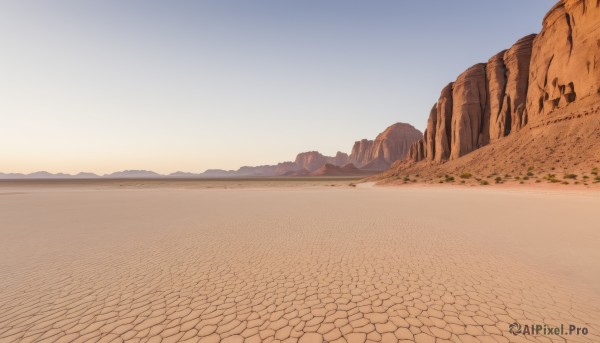 outdoors,sky,day,blue sky,no humans,shadow,beach,scenery,sunset,rock,mountain,sand,horizon,road,landscape,mountainous horizon,gradient sky,shore,desert,water,path,cliff