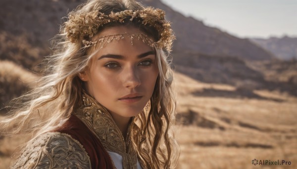 1girl,solo,long hair,looking at viewer,brown hair,hair ornament,brown eyes,jewelry,closed mouth,upper body,earrings,outdoors,day,blurry,lips,grey eyes,depth of field,blurry background,wavy hair,portrait,freckles,circlet,mountain,realistic,nose,head wreath,desert,blonde hair,sky,armor