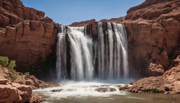 The serene presence of a waterfall in a lush day