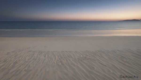 outdoors,sky,water,no humans,ocean,beach,scenery,sunset,sand,horizon,waves,shore,footprints,cloud,sun