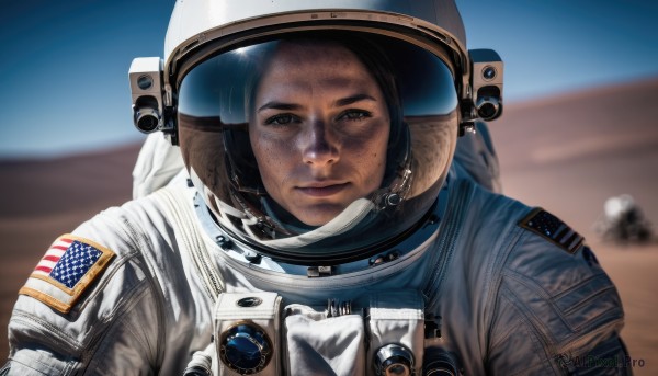 1girl,solo,looking at viewer,smile,1boy,brown eyes,closed mouth,upper body,male focus,blurry,depth of field,blurry background,helmet,freckles,realistic,straight-on,dirty,american flag,spacesuit,desert,space helmet,united states,astronaut,brown hair,black hair,outdoors,sky,day,lips,portrait,reflection,american flag print