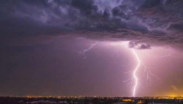 A lightning captured beautifully in a tranquil sunset outdoors