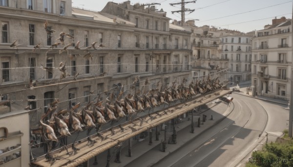 outdoors,sky,day,tree,no humans,window,bird,animal,ground vehicle,building,scenery,motor vehicle,6+boys,city,flag,road,house,power lines,horse,street,utility pole,town,people,6+others,weapon,multiple boys,cityscape