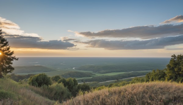 A landscape surrounded by a lush sunset day