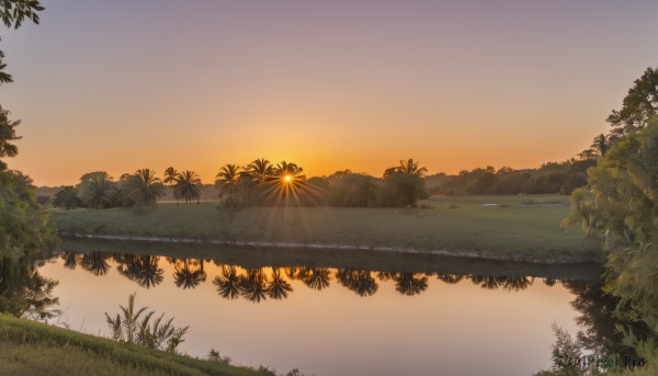 A stunning landscape within a vivid sunset outdoors