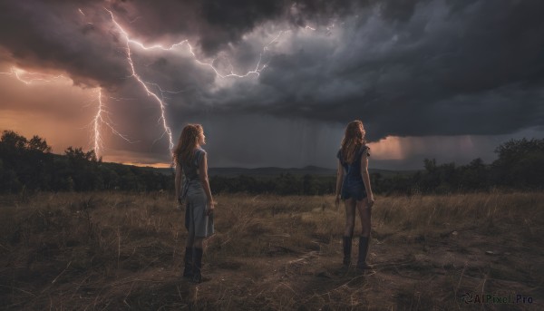 long hair,multiple girls,skirt,brown hair,2girls,standing,boots,outdoors,sky,shorts,cloud,from behind,tree,cloudy sky,grass,nature,scenery,lightning,rain,field