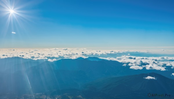 outdoors,sky,day,cloud,blue sky,no humans,ocean,sunlight,building,scenery,lens flare,flying,blue theme,light rays,mountain,city,sun,horizon,cityscape,landscape,mountainous horizon,above clouds,sunbeam