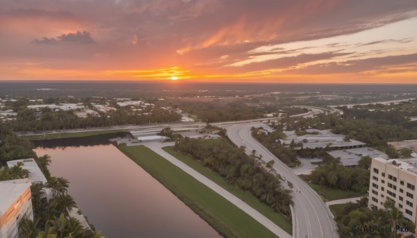 outdoors,sky,cloud,water,tree,no humans,ocean,beach,sunlight,cloudy sky,grass,building,nature,scenery,sunset,city,sun,horizon,road,cityscape,river,landscape,orange sky,plant,skyscraper,shore