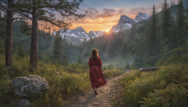 A majestic sunset outdoors featuring a female