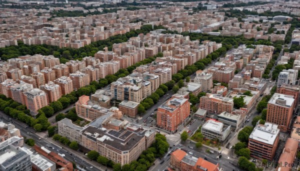 outdoors,tree,no humans,from above,ground vehicle,building,scenery,city,road,cityscape,bridge,river,skyscraper,rooftop,real world location,water,nature,motor vehicle,forest,car,street,landscape