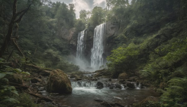 A waterfall surrounded by a serene day