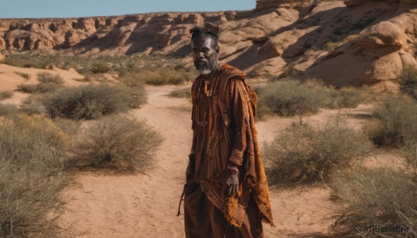 solo,looking at viewer,gloves,long sleeves,1boy,holding,closed mouth,standing,weapon,grey hair,male focus,outdoors,cape,holding weapon,gun,colored skin,facial hair,grass,holding gun,scenery,cloak,beard,robe,black hair,day,belt,pants,signature,rock,desert