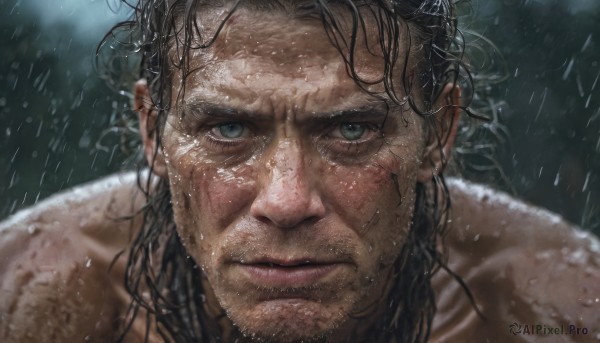 A male captured in a dynamic rainy outdoors