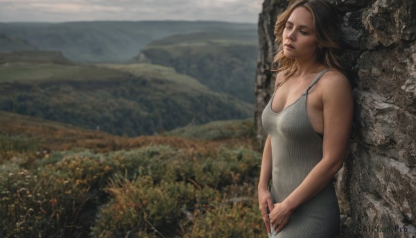 1girl,solo,long hair,breasts,brown hair,dress,cleavage,bare shoulders,brown eyes,medium breasts,standing,closed eyes,outdoors,parted lips,sleeveless,day,white dress,blurry,lips,sleeveless dress,blurry background,freckles,mountain,realistic,grey dress,sky,tree,own hands together,nature,field