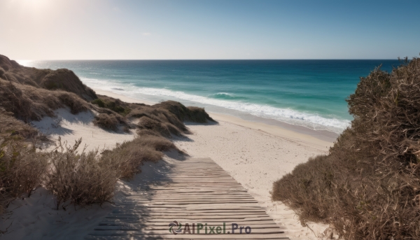 outdoors,sky,day,water,tree,blue sky,no humans,shadow,ocean,beach,grass,plant,scenery,rock,stairs,sand,horizon,shore,cloud,nature,waves,landscape