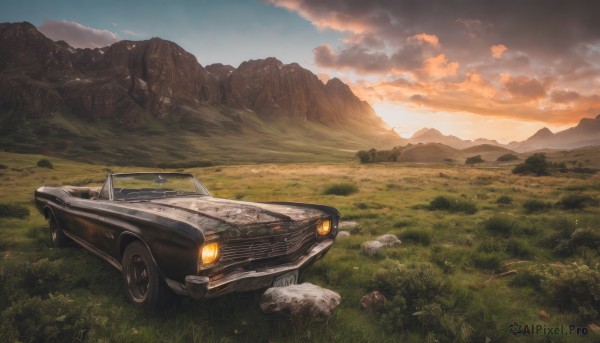 outdoors,sky,cloud,tree,no humans,cloudy sky,grass,ground vehicle,nature,scenery,motor vehicle,sunset,mountain,car,road,vehicle focus,landscape,mountainous horizon,sports car,rock,field,evening