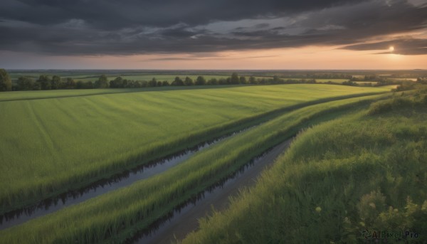A landscape portrayed in a vivid sunset outdoors