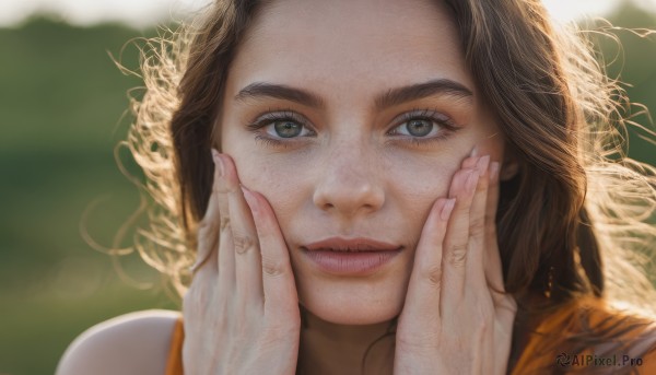 1girl,solo,long hair,looking at viewer,smile,blue eyes,brown hair,brown eyes,blurry,lips,fingernails,grey eyes,eyelashes,depth of field,blurry background,portrait,close-up,curly hair,realistic,nose,hands on own face,hands on own cheeks,closed mouth