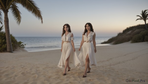 long hair,looking at viewer,smile,multiple girls,brown hair,black hair,dress,2girls,brown eyes,jewelry,closed mouth,standing,full body,short sleeves,outdoors,sky,sleeveless,day,belt,dark skin,water,necklace,white dress,high heels,dark-skinned female,tree,holding hands,ocean,beach,sandals,side slit,walking,skirt hold,sand,palm tree,long dress,arms at sides,horizon,shore,breasts,scenery,sunset,realistic