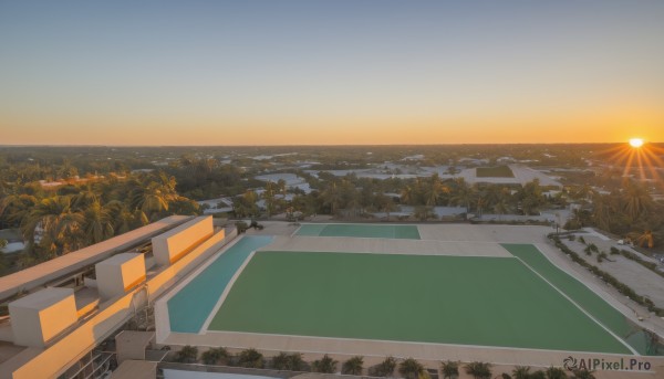 A landscape showcased in a vivid sunset outdoors