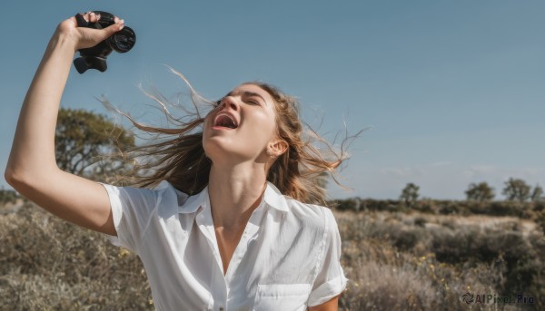 1girl,solo,long hair,open mouth,brown hair,shirt,holding,closed eyes,white shirt,upper body,short sleeves,outdoors,sky,teeth,day,tongue,collared shirt,artist name,blurry,arm up,tree,blue sky,blurry background,upper teeth only,watermark,realistic,camera,photo background,binoculars,holding camera,school uniform,wind,what,screaming