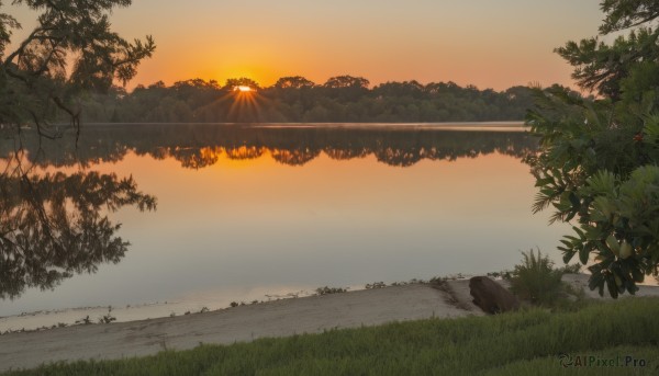 A landscape set against the backdrop of a serene sunset outdoors