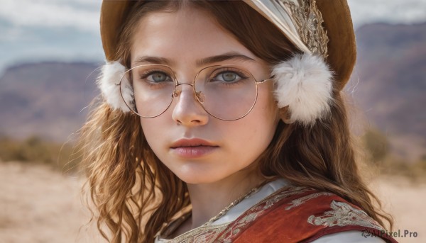 1girl,solo,long hair,looking at viewer,blue eyes,brown hair,hat,closed mouth,green eyes,outdoors,glasses,day,mole,blurry,lips,eyelashes,mole under eye,depth of field,blurry background,wavy hair,portrait,freckles,curly hair,mountain,realistic,nose,round eyewear,brown headwear,brown-framed eyewear,bangs,parted lips,sky,expressionless,forehead,earmuffs,rimless eyewear