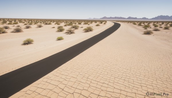 outdoors,sky,day,tree,blue sky,no humans,shadow,grass,nature,scenery,mountain,sand,road,landscape,path,hill,desert,cloud,water,ocean,beach,horizon,bush,river,shore