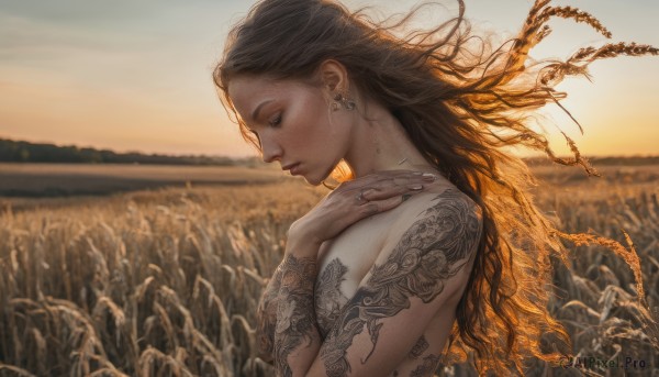 The elegance of a female in a tranquil sunset outdoors