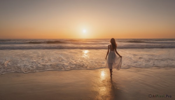 1girl, solo, long hair, brown hair, dress, outdoors, sky, barefoot, water, from behind, white dress, ocean, beach, scenery, walking, sunset, skirt hold, sun, horizon, footprints