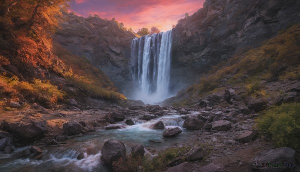 A striking sunset outdoors featuring the elegance of a waterfall