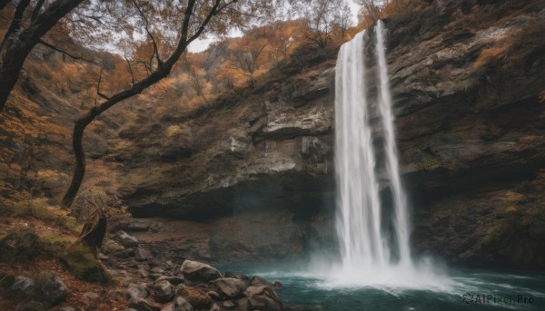 A waterfall framed by the beauty of a calm outdoors