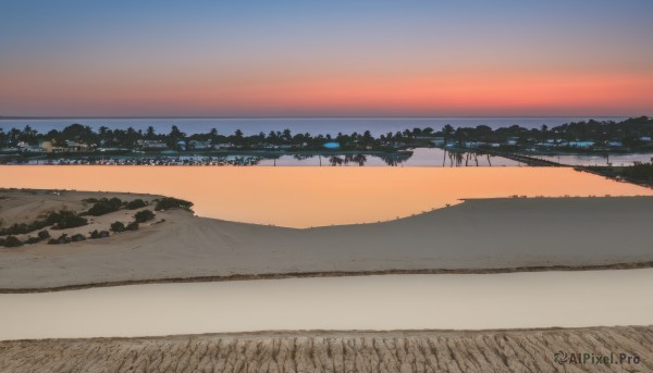 A charming sunset outdoors with a landscape