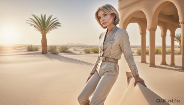 1girl,solo,looking at viewer,short hair,blue eyes,blonde hair,shirt,long sleeves,standing,white shirt,outdoors,parted lips,sky,day,belt,pants,tree,lips,sunlight,plant,sunset,realistic,white pants,nose,sand,palm tree,sun,brown belt,desert,brown hair,jewelry