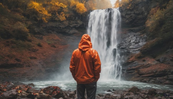 solo, 1boy, standing, jacket, male focus, outdoors, pants, hood, water, from behind, hoodie, black pants, scenery, rock, hands in pockets, waterfall, orange hoodie