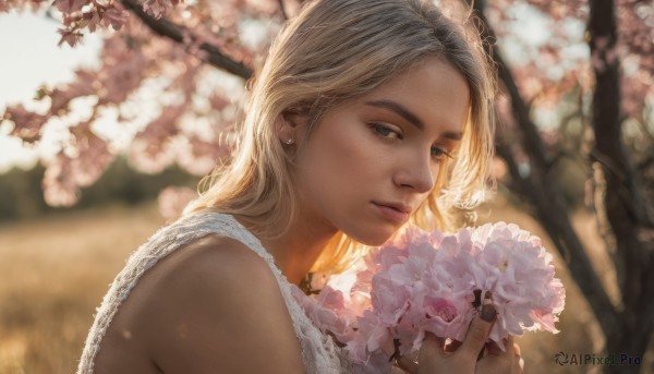 1girl, solo, long hair, looking at viewer, blue eyes, blonde hair, holding, bare shoulders, jewelry, upper body, flower, earrings, outdoors, blurry, tree, lips, blurry background, bouquet, realistic, nose