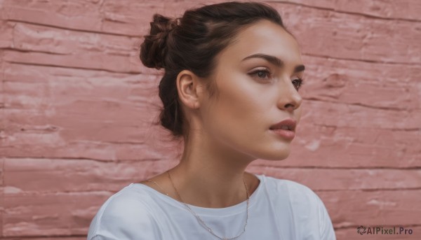 1girl,solo,short hair,brown hair,shirt,brown eyes,jewelry,white shirt,upper body,parted lips,teeth,necklace,hair bun,lips,single hair bun,portrait,realistic,wall,brick wall,looking away