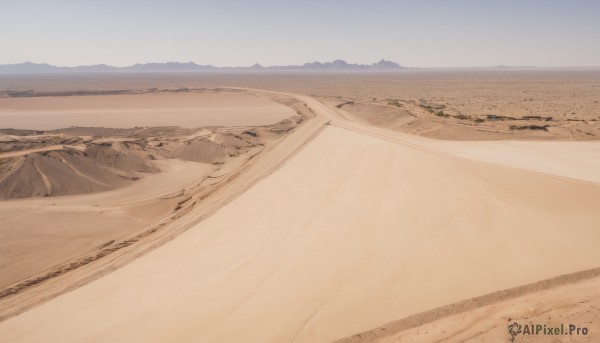 outdoors,sky,day,blue sky,no humans,beach,scenery,mountain,sand,horizon,road,field,landscape,mountainous horizon,shore,desert,footprints,monochrome,water,ocean