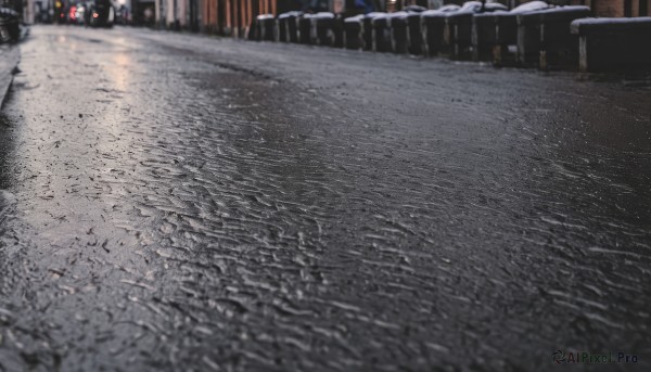 outdoors,blurry,tree,no humans,night,ground vehicle,building,nature,scenery,motor vehicle,snow,city,fence,car,road,winter,lamppost,street,photo background,real world location,depth of field,blurry background,snowing,bare tree,pavement,sidewalk