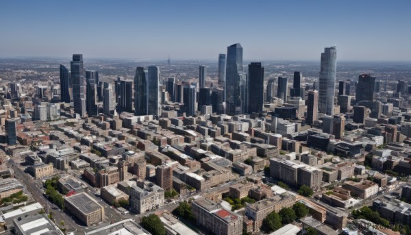 outdoors,sky,day,water,tree,blue sky,no humans,ocean,from above,building,scenery,city,horizon,road,cityscape,river,skyscraper,landscape,rooftop,real world location,ground vehicle,motor vehicle,car,skyline