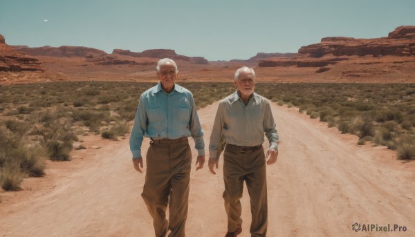 short hair,shirt,long sleeves,standing,jacket,closed eyes,white shirt,white hair,male focus,outdoors,multiple boys,sky,day,collared shirt,belt,pants,2boys,tree,blue sky,feet out of frame,facial hair,grass,blue shirt,scenery,beard,walking,pocket,realistic,field,brown pants,old,old man,desert,wrinkled skin,dark skin,dark-skinned male,mountain,sand,landscape,mountainous horizon