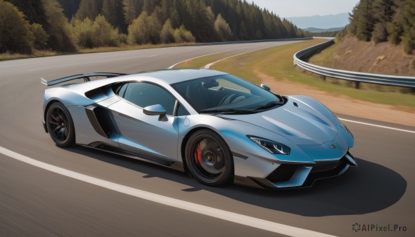 A motor vehicle surrounded by a lush outdoors
