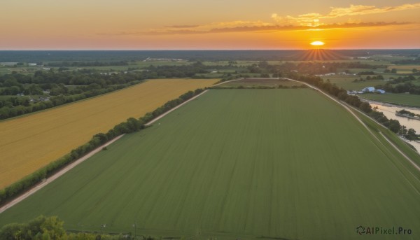 A landscape set against the backdrop of a serene sunset outdoors